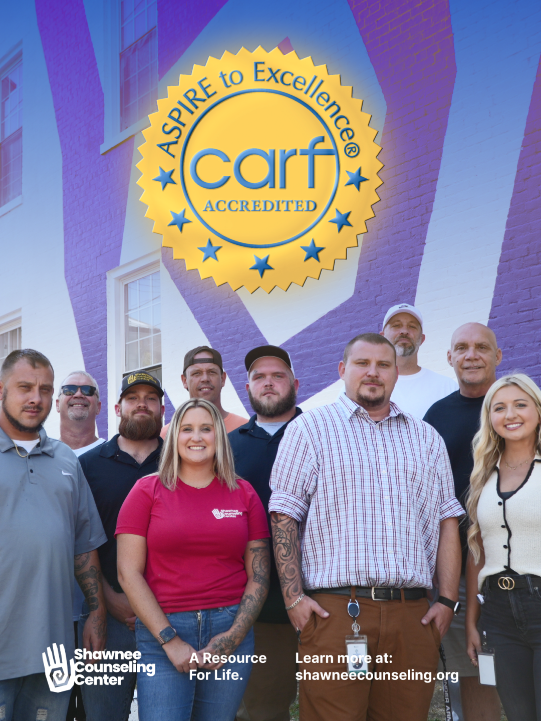 Shawnee Counseling Center team with a CARF accreditation seal and A Resource For Life message.